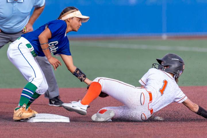 Green Valley infielder Cindy Martinez-Escamilla (7) makes the tag out as Douglas runner Emma St ...