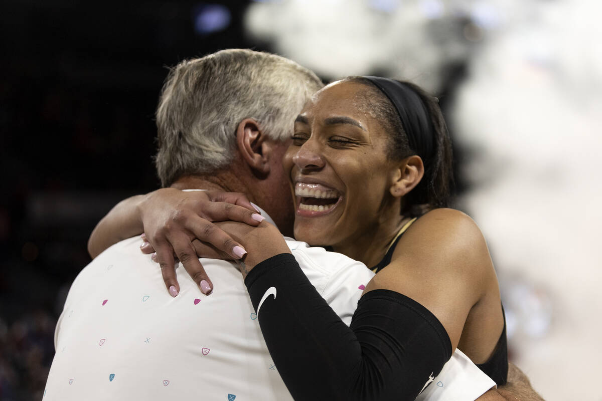 Las Vegas Aces forward A'ja Wilson (22) embraces her former coach, Bill Laimbeer, after a WNBA ...