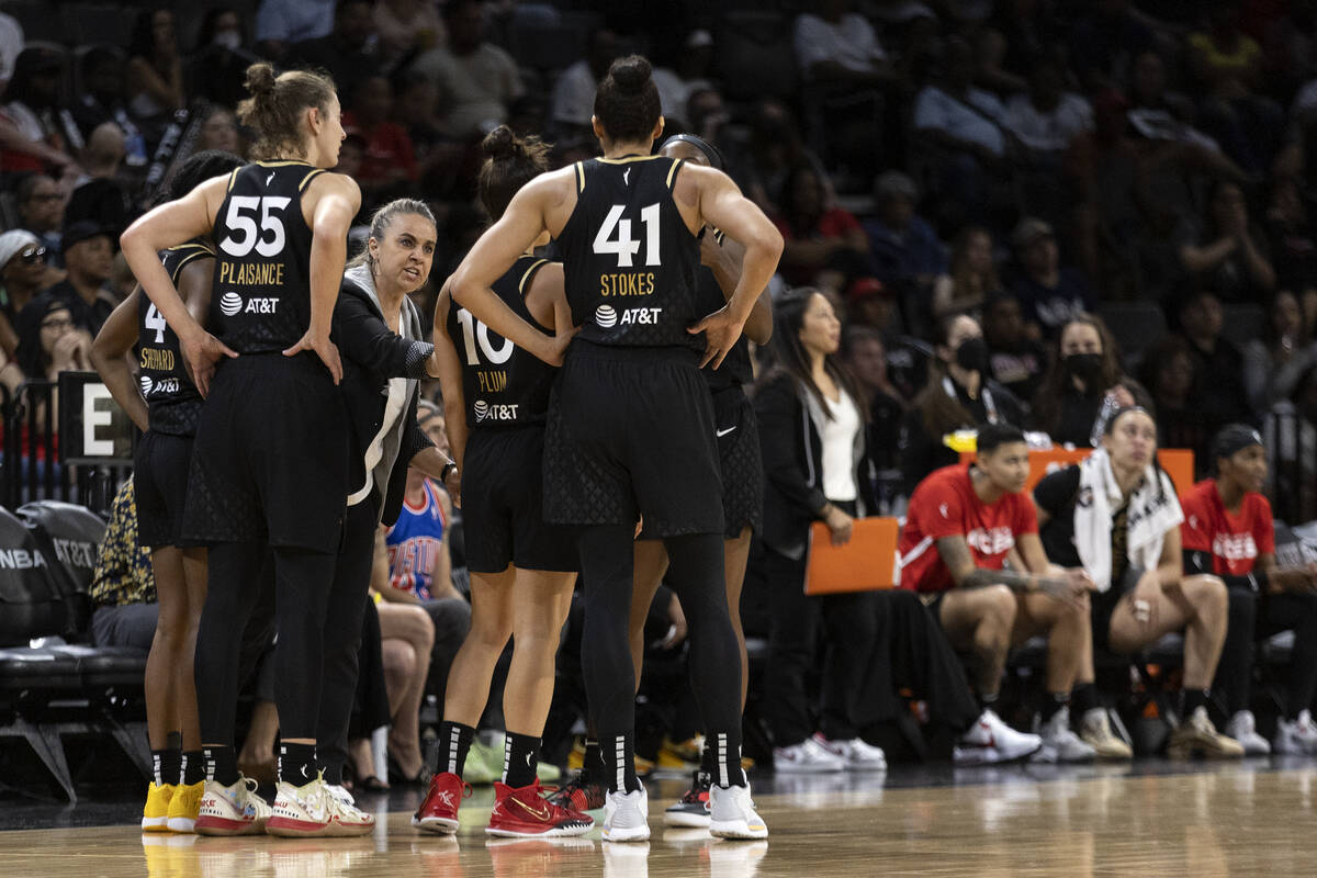 Las Vegas Aces head coach Becky Hammon speaks to her team during a time out in the second half ...