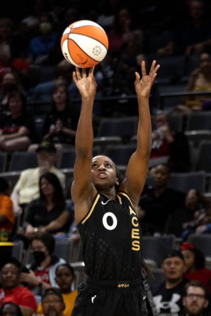Las Vegas Aces guard Jackie Young (0) attempts a shot during the first half of a WNBA basketbal ...