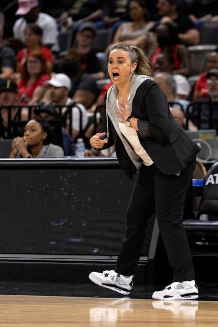Las Vegas Aces head coach Becky Hammon shouts from the sidelines during the second half of a WN ...