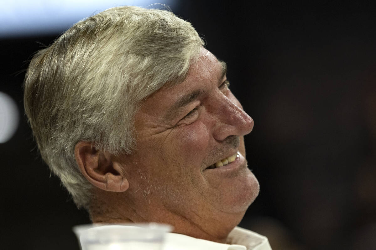Former Las Vegas Aces head coach Bill Laimbeer laughs as a video he is featured in plays on the ...