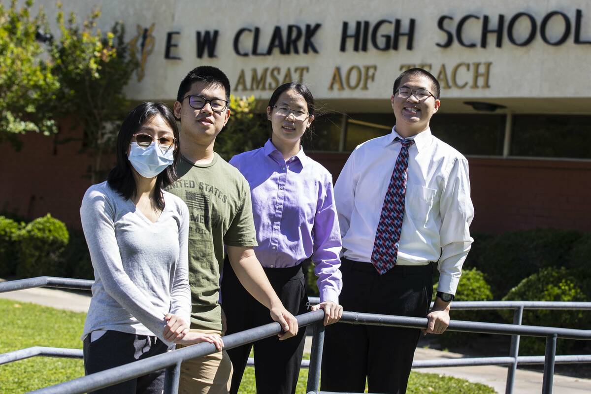 Clark High School students, from left to right, Hannah Pham, Edwin Ma, Grace Hwang and her twin ...