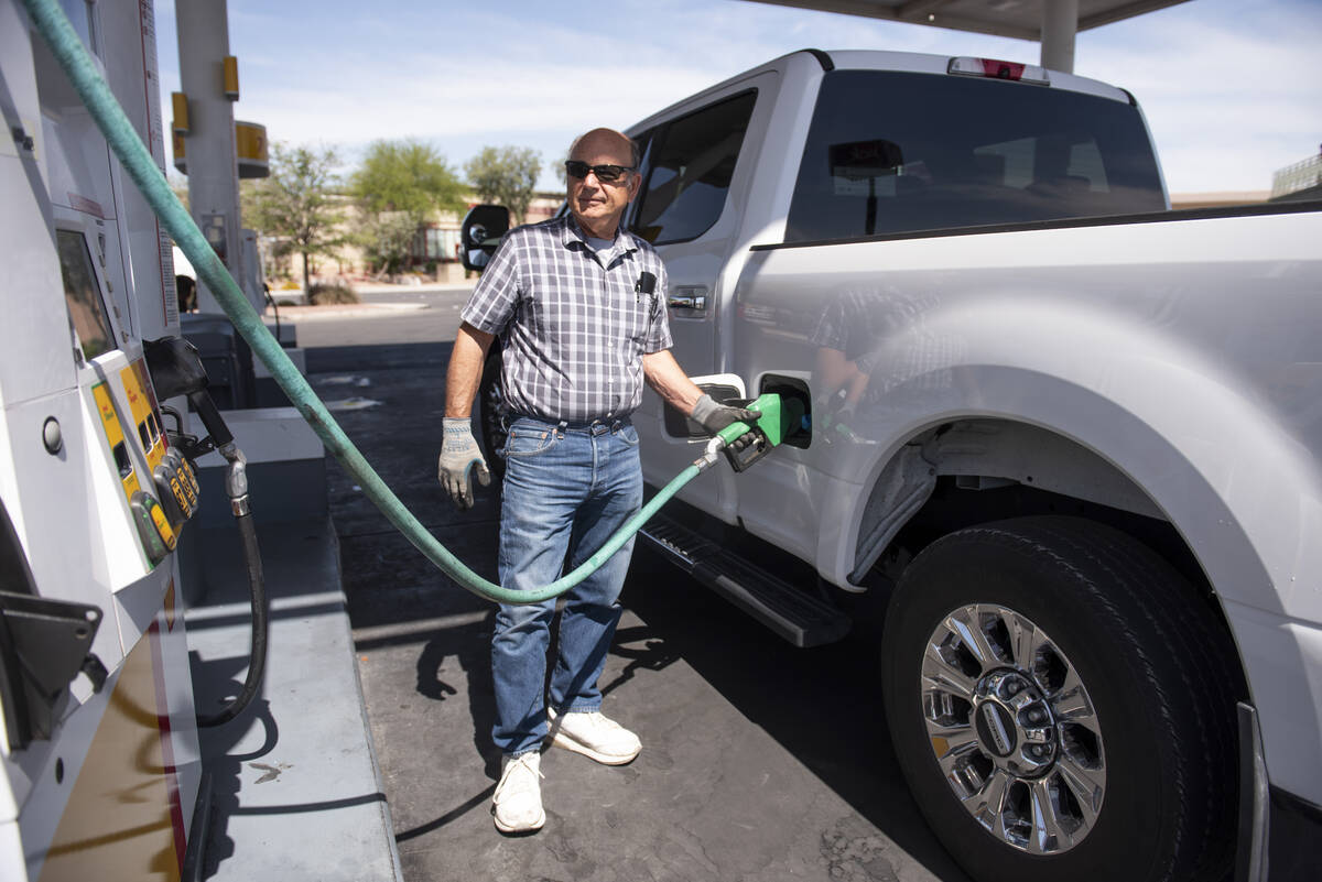 Alan Azzarello, of San Jose, California, pumps diesel fuel at a Shell station on Blue Diamond R ...