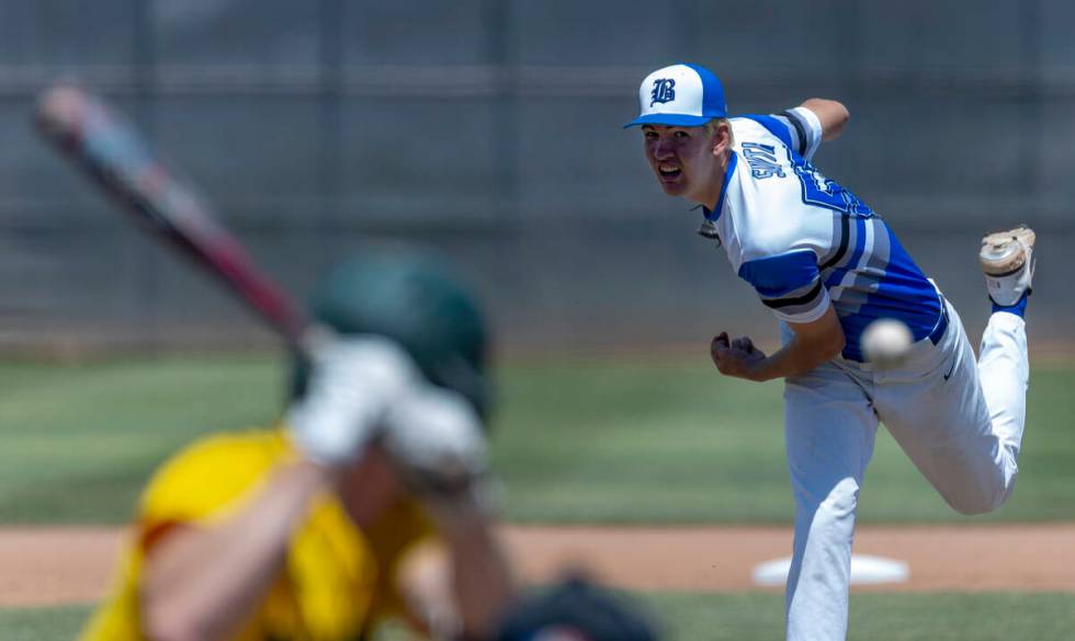 Basic pitcher Ben Smith (57) tosses another ball to the plate and a Bishop Manogue batter durin ...