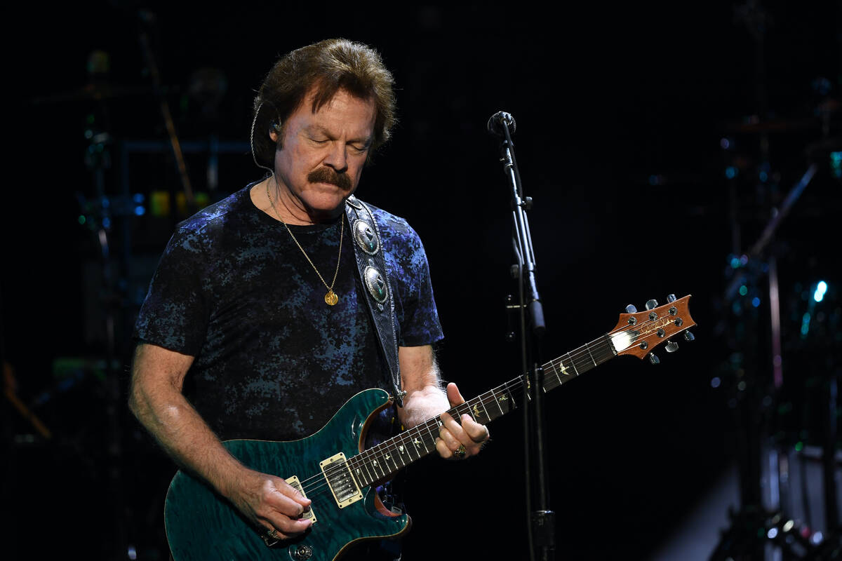 Guitarist/singer Tom Johnston of The Doobie Brothers performs at Zappos Theater At Planet Holly ...