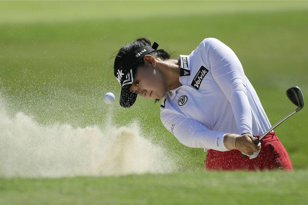 In this April 25, 2019, file photo, Youngin Chun, of South Korea, hits out of a bunker on the f ...