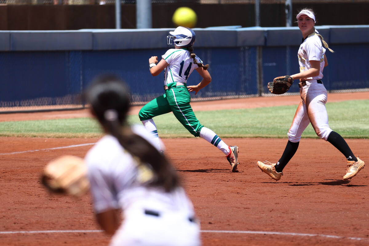 Green Valley's Rustie Riley (14) runs safely to third base against Faith Lutheran during a Clas ...