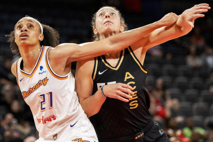Phoenix Mercury forward Brianna Turner (21) boxes out Aces forward Theresa Plaisance (55) in th ...