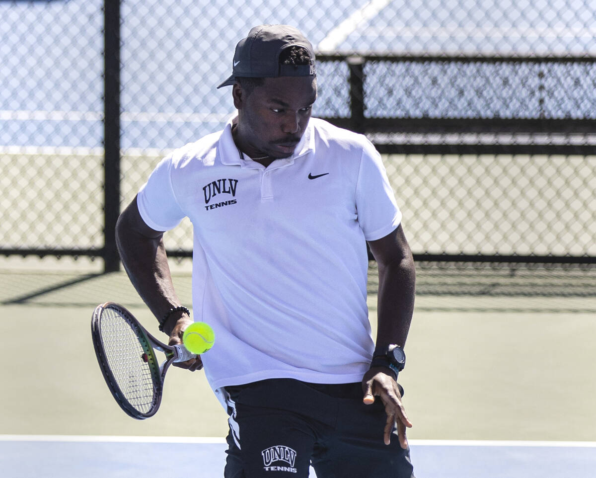 UNLV senior tennis player Christopher Bulus returns the ball during practice at Frank and Vicki ...