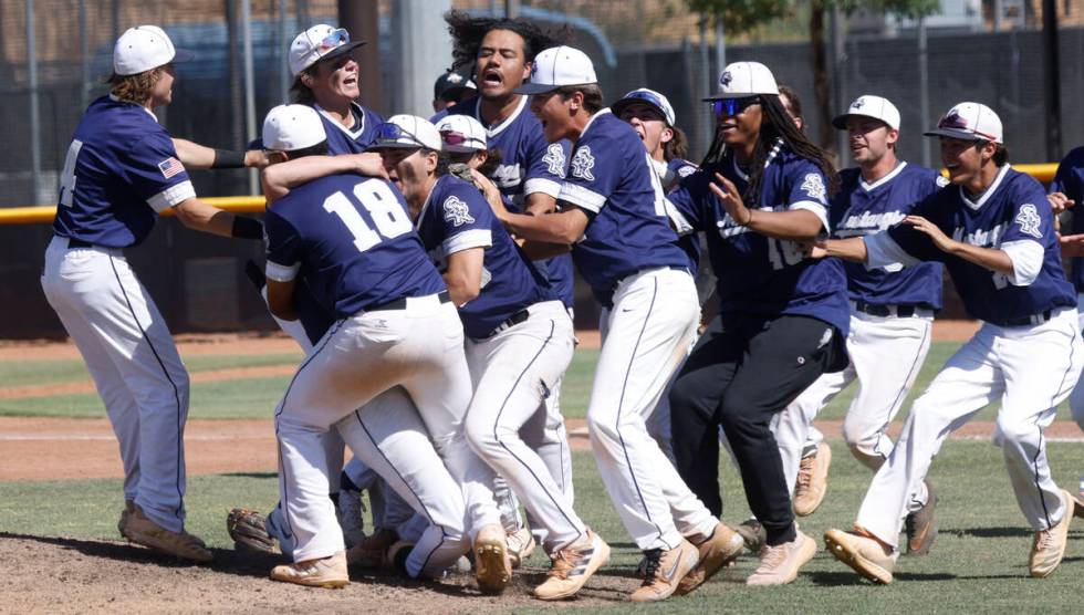 Shadow Ridge High School players celebrate their 5-1 victory against Legacy High School after t ...