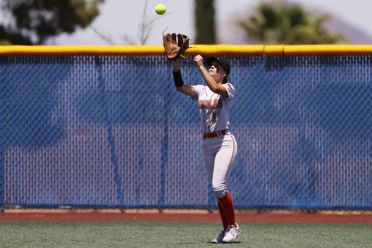 Douglas' Emma Stagliano (4) makes a catch in the outfield for an out against Green Valley durin ...
