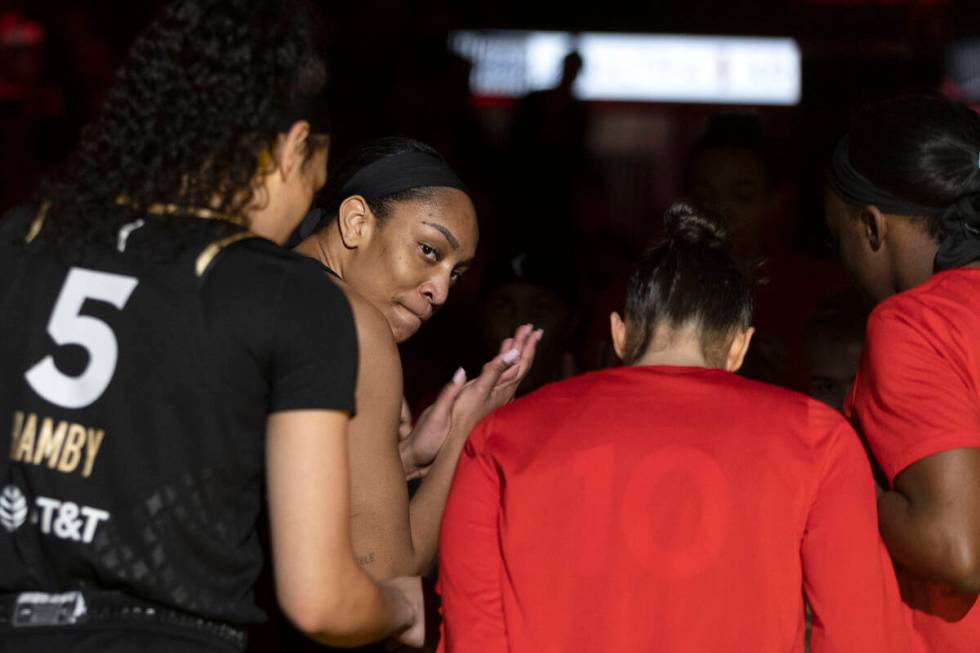 Las Vegas Aces forward A'ja Wilson claps with teammates before a WNBA basketball game against t ...
