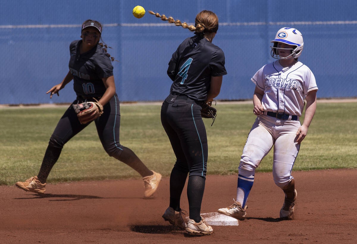 Bishop Gorman’s Olivia Bailey (3) beats the throw to second base intended for Silverado& ...