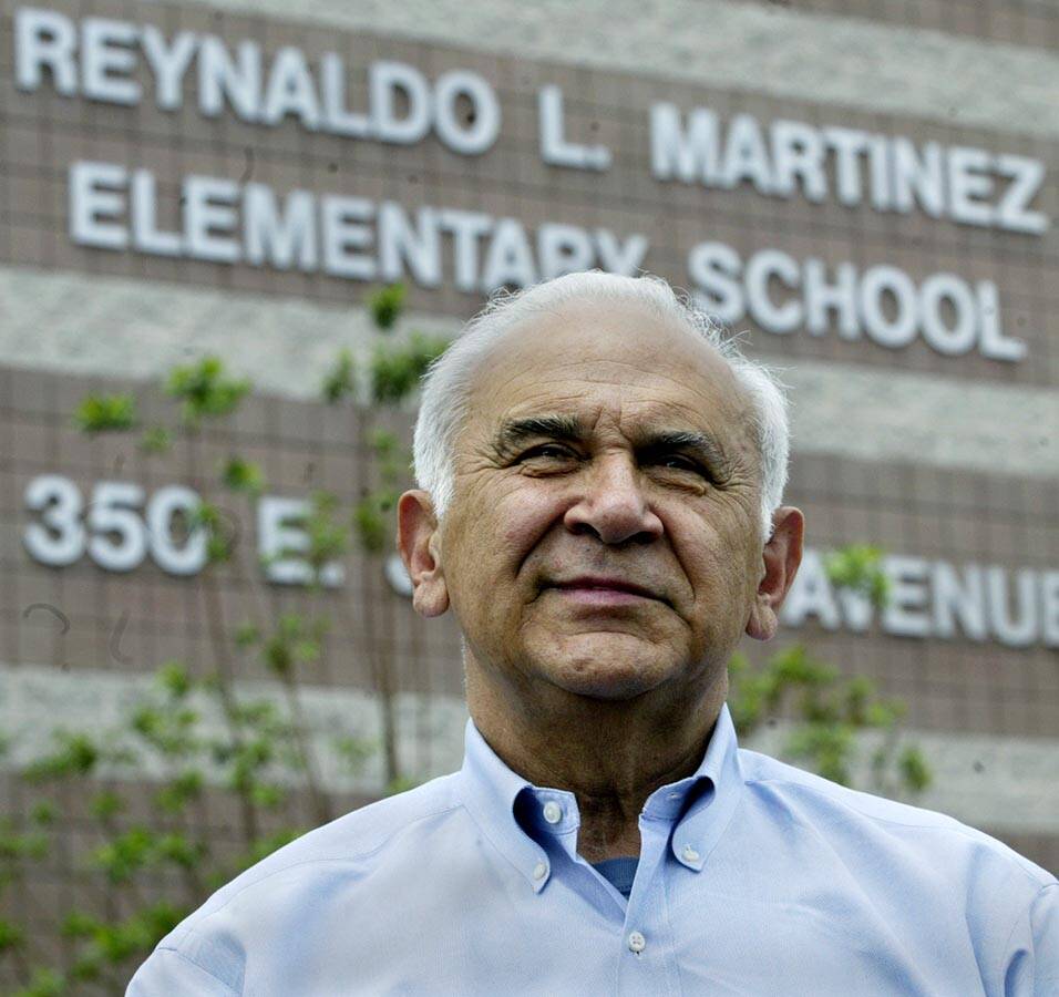 RJ FILE*** SPORTS - Rey Martinez stands in front of the Reynaldo L. Martinez Elementary School ...