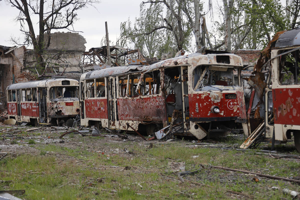 Destroyed trams stand in a depot in Mariupol, in territory under the government of the Donetsk ...