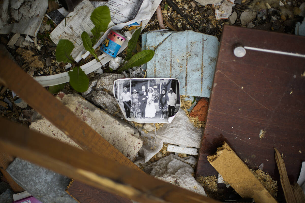 A wedding photograph lies among rubble from a Russian strike earlier in the war in Kramatorsk, ...