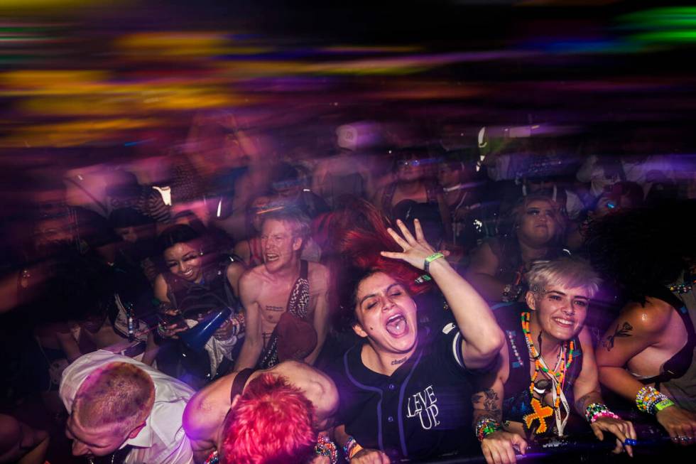 Attendees listen to music at Base Pod during day three of Electric Daisy Carnival on Sunday, Ma ...