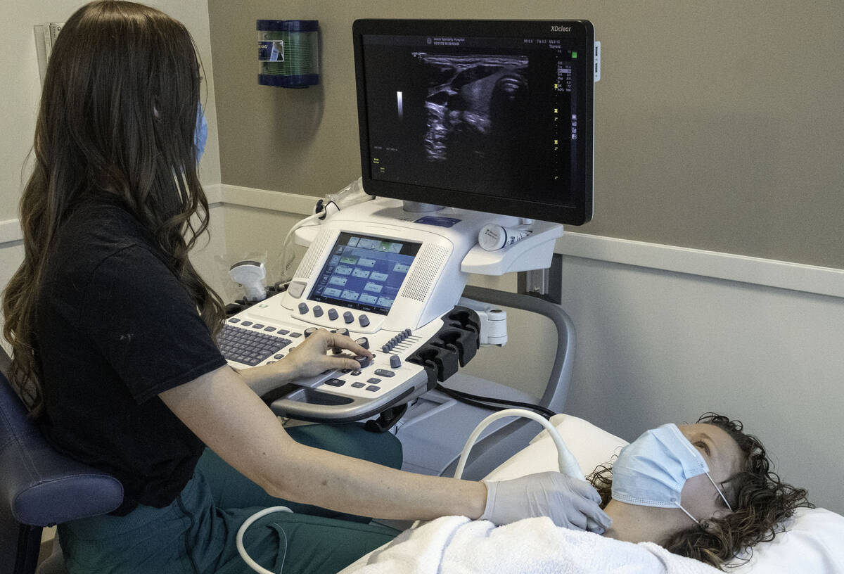 A technician performs an ultrasound on a patient. The Helmsley Charitable Trust announced $4.2 ...