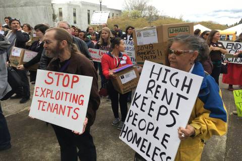 Supporters of a bill to ban most no-cause evictions of home renters in Oregon demonstrate on th ...