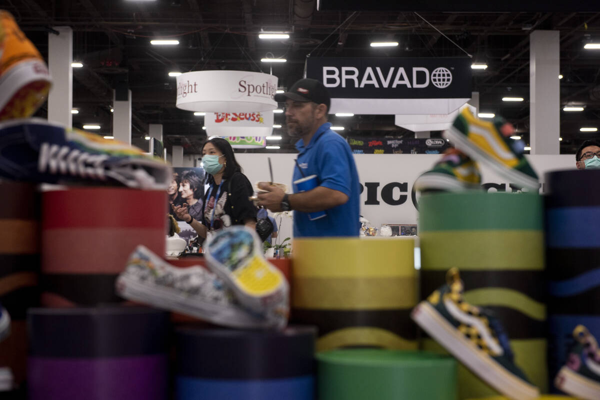People prepare for the opening of the Licensing Expo at the Mandalay Bay Convention Center on M ...