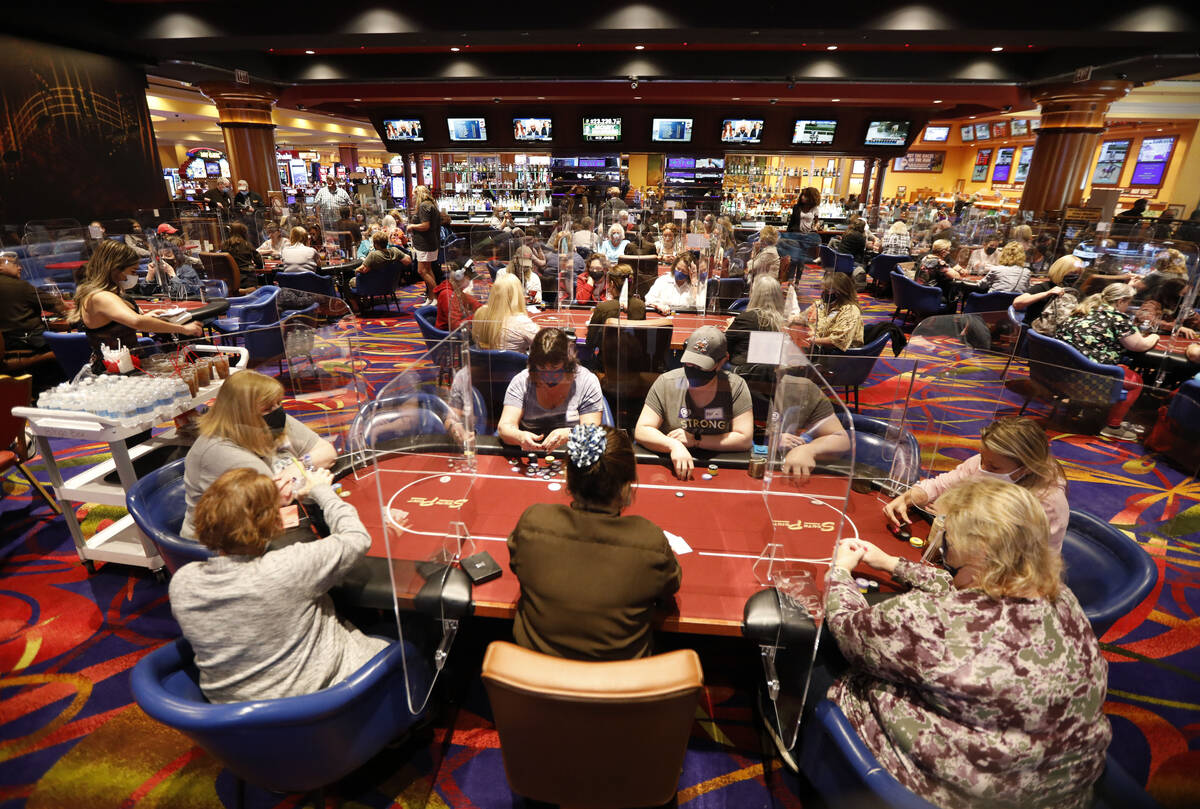 In this April 15, 2021, file photo, women play in $175 No-Limit Hold'em Ladies tournament durin ...