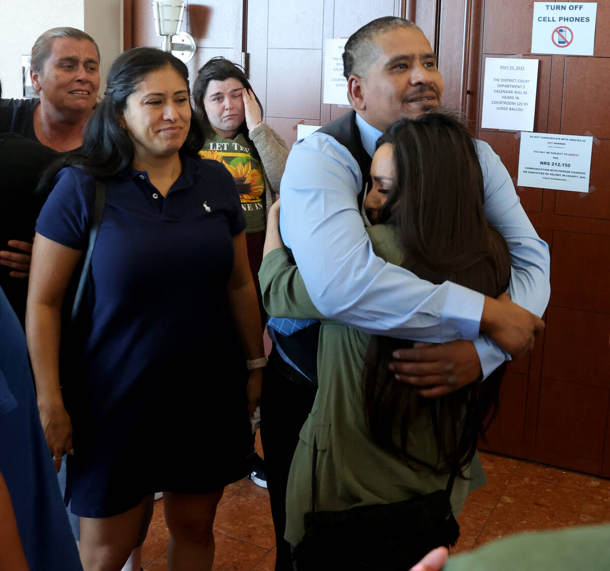 Ivan Arenas, father of Marcos Arenas, hugs his sister Karina Arenas after a guilty verdict in t ...