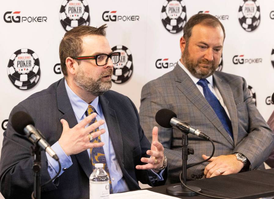 Jack Effel, vice president of WSOP, left, speaks as Ty Stewart, executive operation of WSOP, lo ...