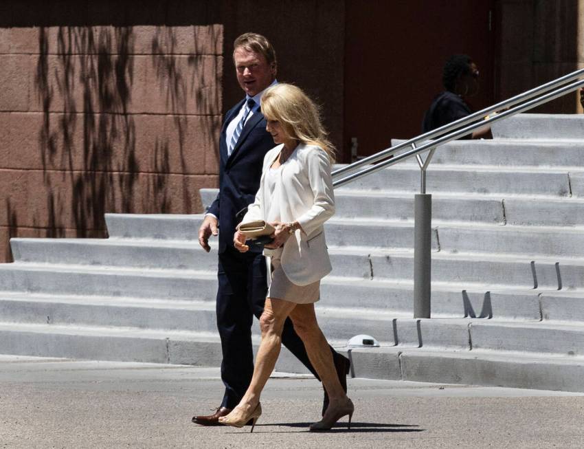 Former Raiders coach Jon Gruden and his wife, Cindy, leave the Regional Justice Center after ap ...