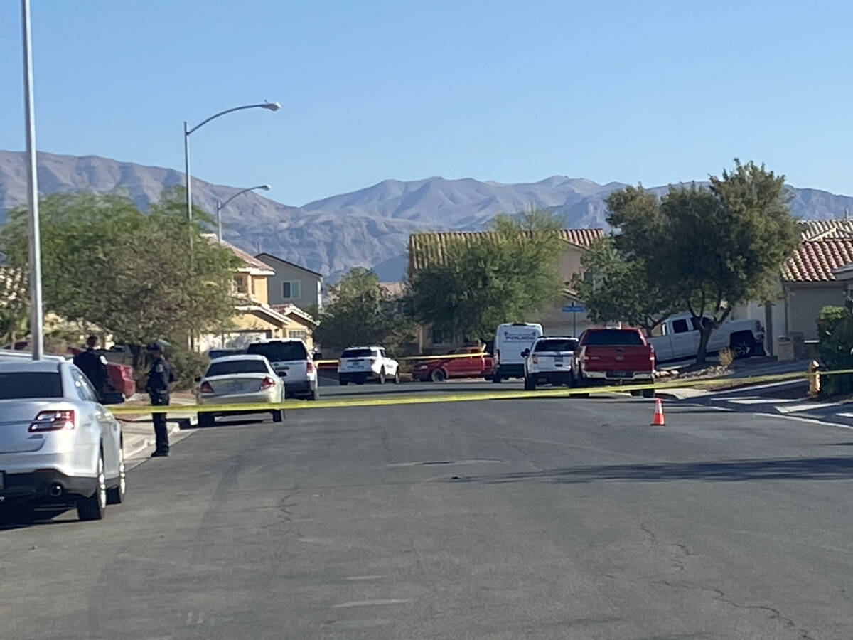 North Las Vegas police investigate a shooting, Wednesday, May 25, 2022, near the 1800 block of ...