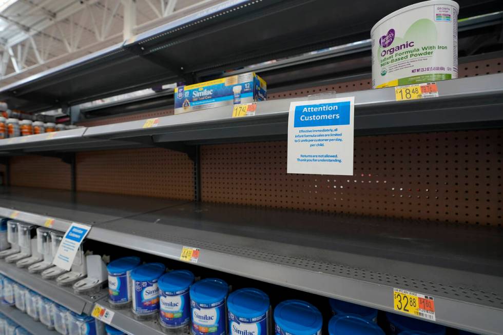 FILE - Shelves typically stocked with baby formula sit mostly empty at a store in San Antonio, ...