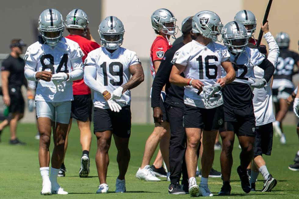Raiders wide receivers Tyron Johnson (84), DJ Turner (19) and Dillon Stoner (16) during practic ...