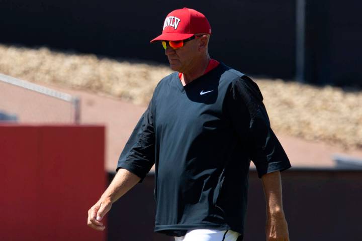 UNLV head coach Stan Stolte walks in from a time out during an NCAA baseball game against UNR a ...