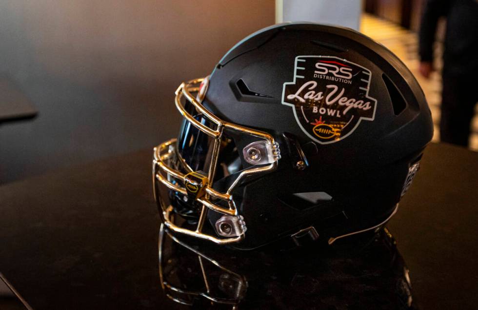 A football helmet is pictured with the Las Vegas Bowl logo on Monday, Dec. 27, 2021. (Chase Ste ...