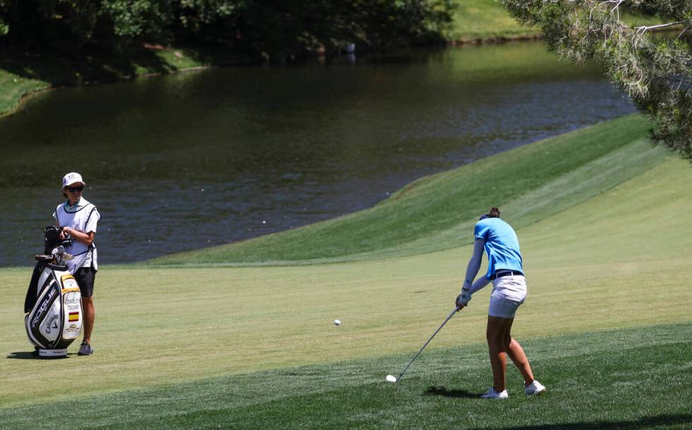 Carlota Ciganda makes a fairway shot at the ninth hole during the second day of round-robin in ...