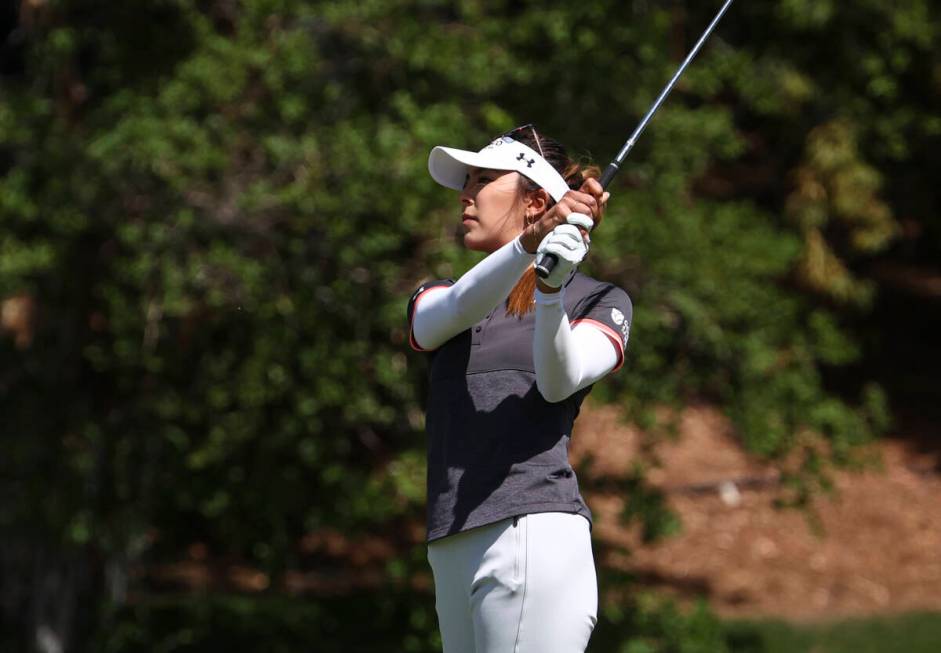 Alison Lee watches her fairway shot on the ninth hole during the second day of round-robin in t ...