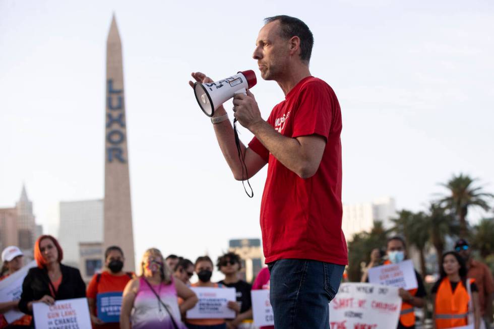 Clark County Commissioner Justin Jones speaks during a rally and march by Moms Demand Action an ...
