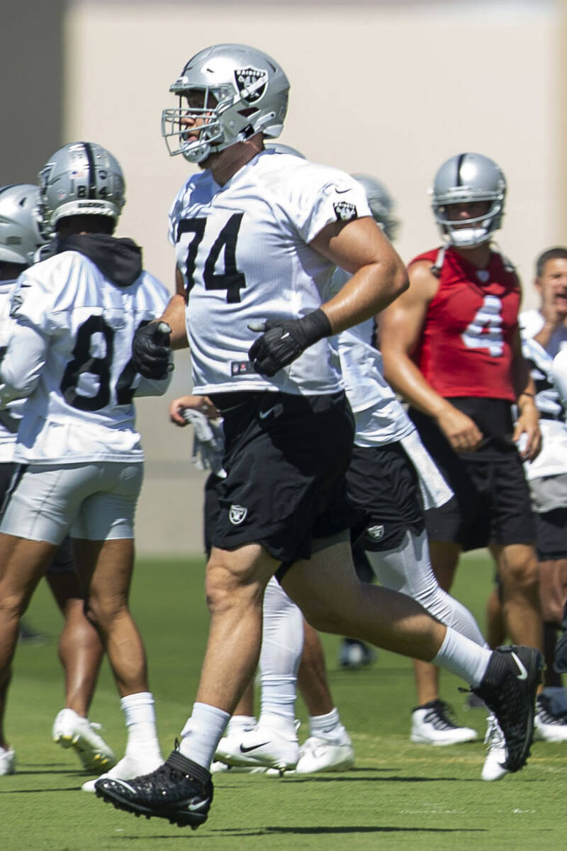 Raiders offensive tackle Kolton Miller runs on the field during practice on Thursday, May 26, 2 ...