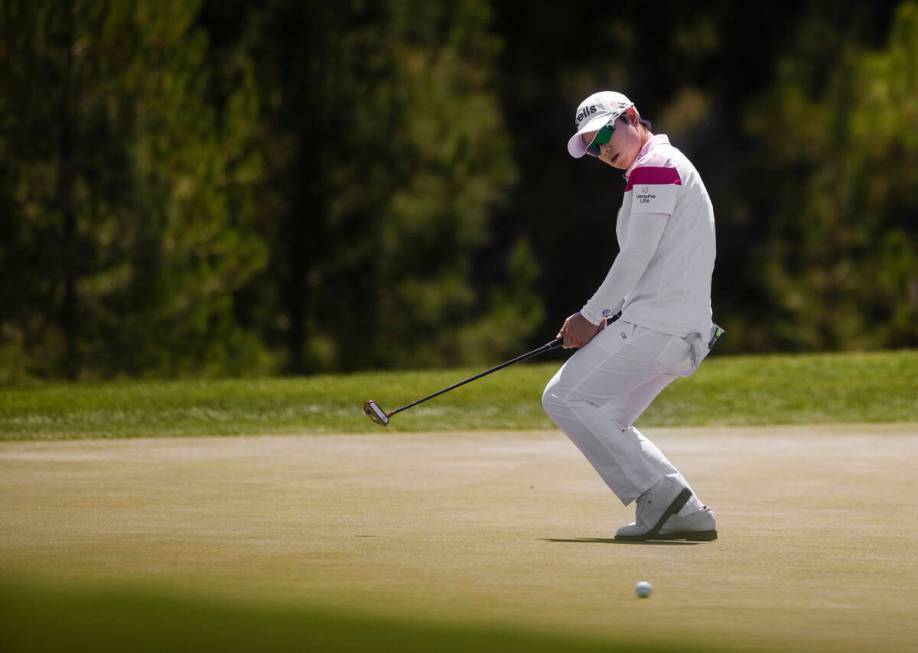 Eun-Hee Ji tries to will a put in on the 5th hole during the fourth day of the LPGA Bank of Hop ...