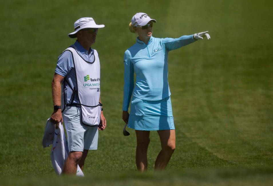 Madalene Sagstrom, right, talks with her caddy on the 6th hole during the fourth day of the LPG ...