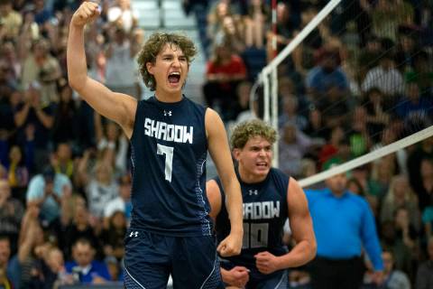 Shadow Ridge’s Tyler Kirk (7) and Trevor Prince (10) cheer after winning a set during th ...