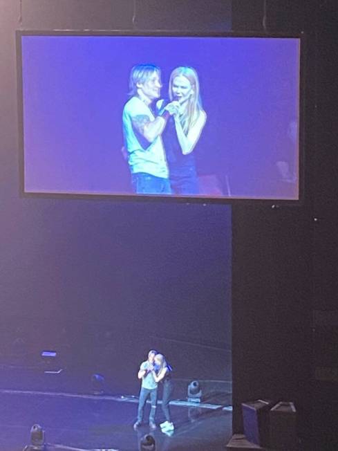 Keith Urban is shown with Nicole Kidman during Urban's performance at the Colosseum at Caesars ...