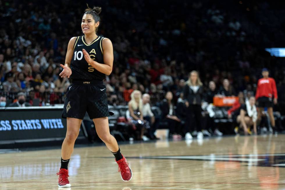 Las Vegas Aces guard Kelsey Plum (10) claps for her team during the second half of a WNBA baske ...