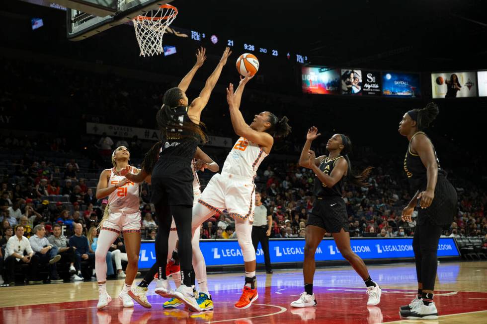 Connecticut Sun forward Alyssa Thomas (25) shoots against Las Vegas Aces center Kiah Stokes (41 ...