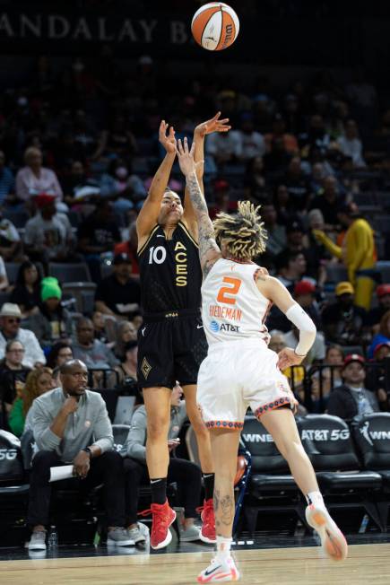 Las Vegas Aces guard Kelsey Plum (10) shoots against Connecticut Sun guard Natisha Hiedeman (2) ...