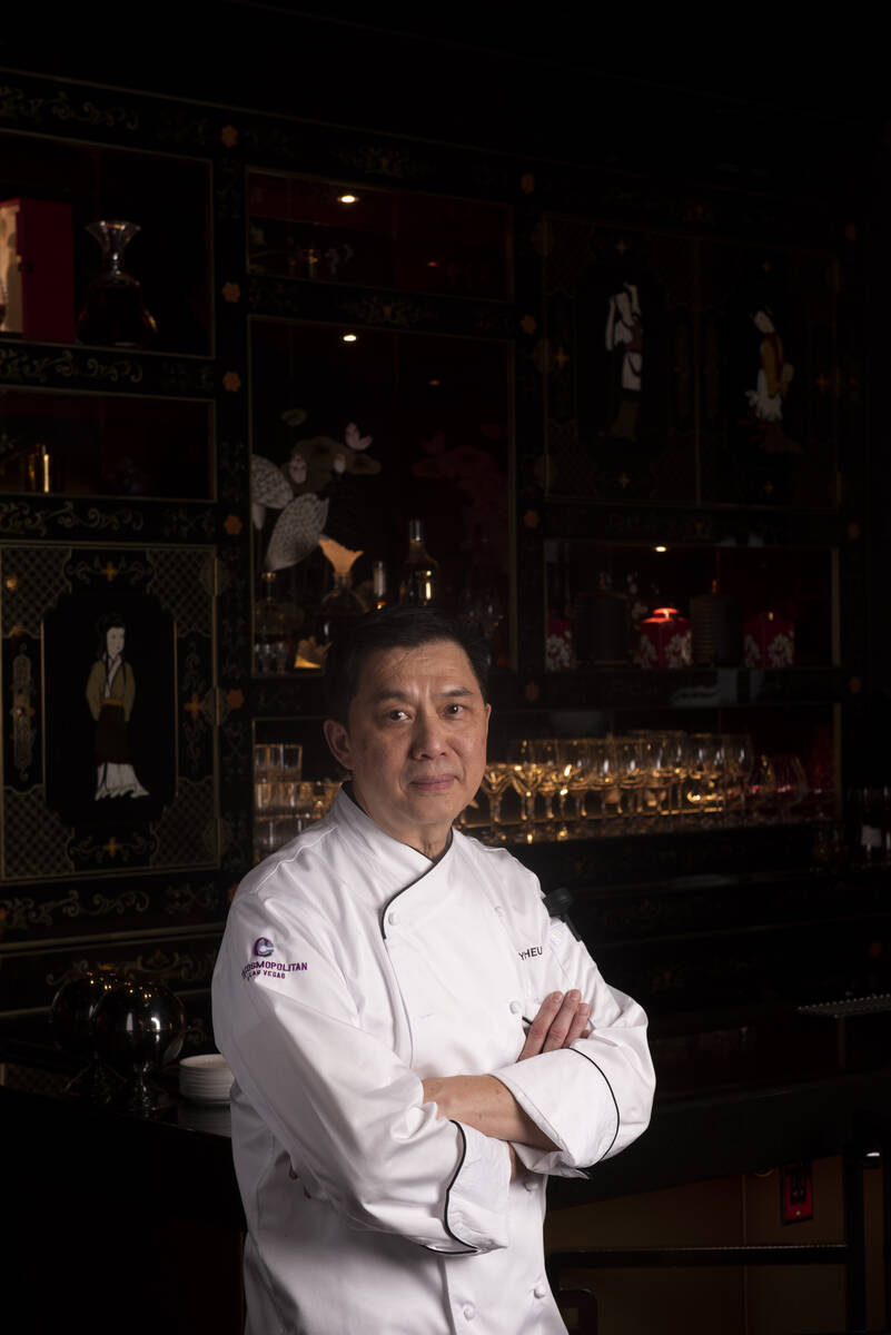 Chef Yip Cheung poses for a portrait at the bar inside Red Plate, a Chinese restaurant in the C ...