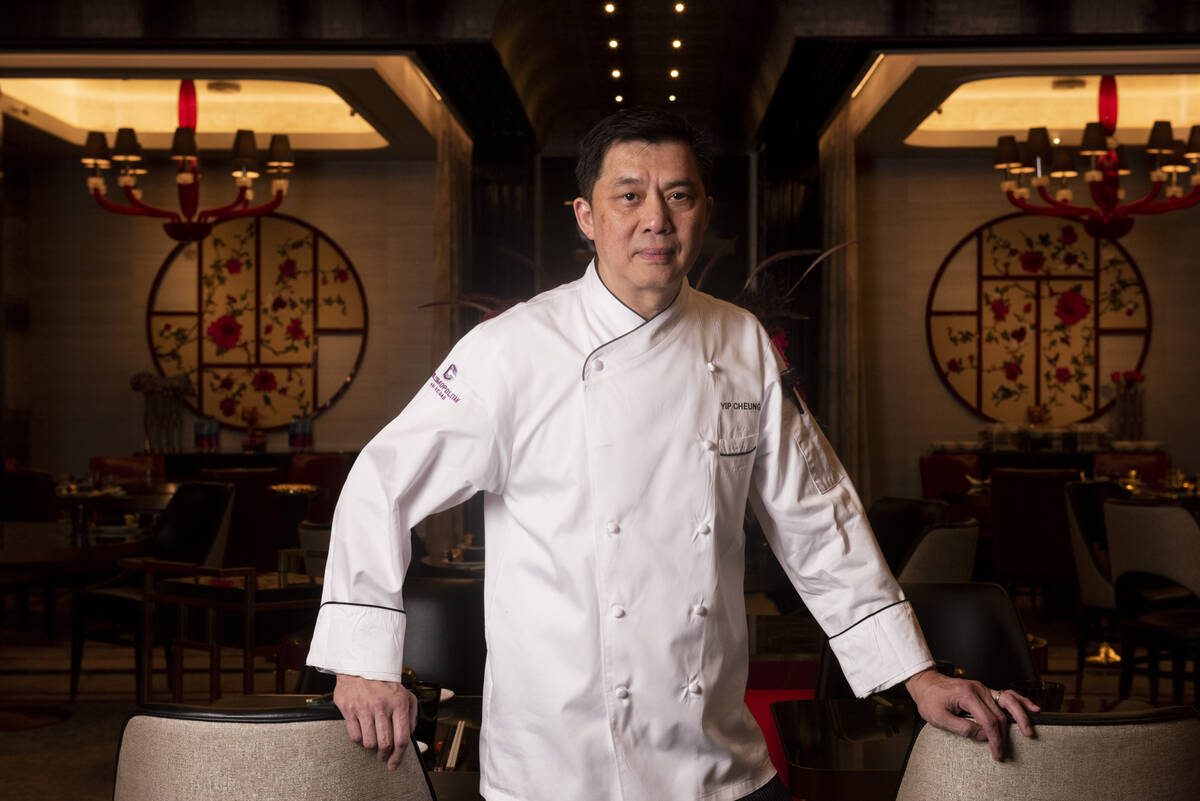 Chef Yip Cheung poses for a portrait in the dining room at Red Plate, a Chinese restaurant in t ...