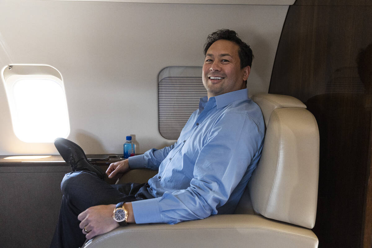 Vegas Justice League founder Justin Woo sits in a private jet at Cirrus Aviation Services on Tu ...