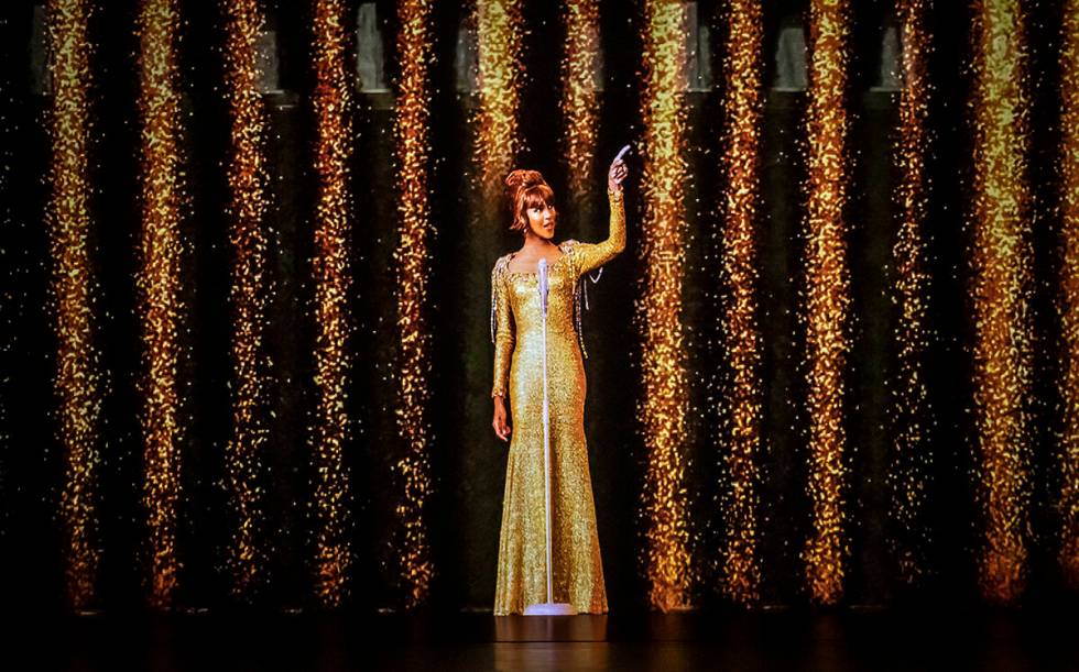 An image from "An Evening with Whitney - The Whitney Houston Hologram Concert." The is closing ...