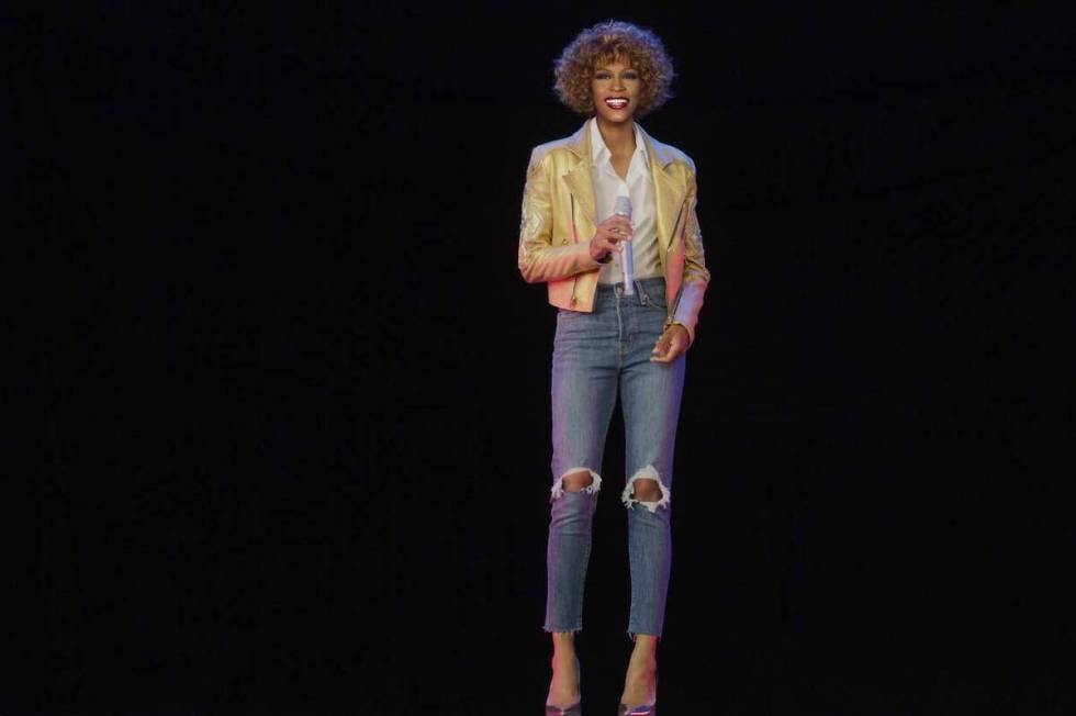 An image from "An Evening with Whitney - The Whitney Houston Hologram Concert." The is closing ...